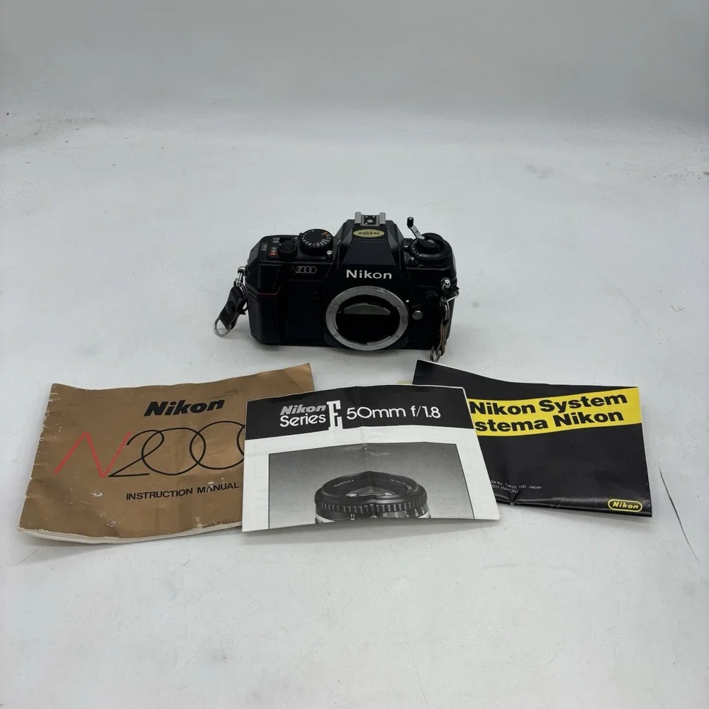 Nikon N2000 35mm Film Camera Body Only With Manuals Black Untested
